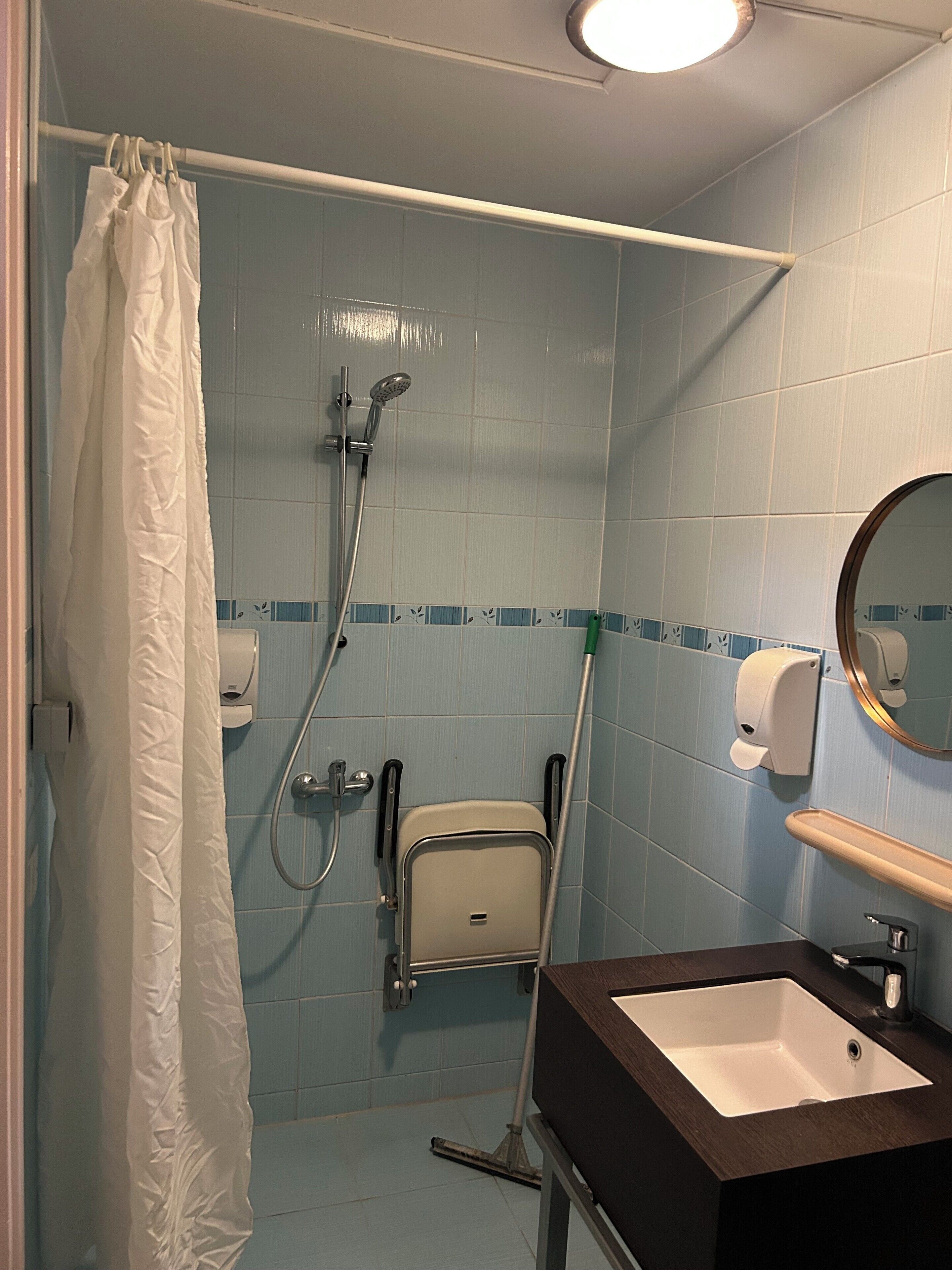 basic twin room, no windows | bathroom | shower, free toiletries, hair dryer, towels
