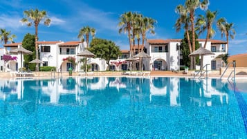 Seasonal outdoor pool, pool umbrellas, pool loungers