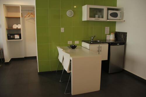 Microwave, coffee/tea maker, electric kettle, cookware/dishes/utensils