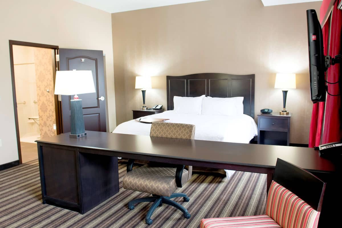 king studio suite | premium bedding, pillow-top beds, blackout curtains, iron/ironing board