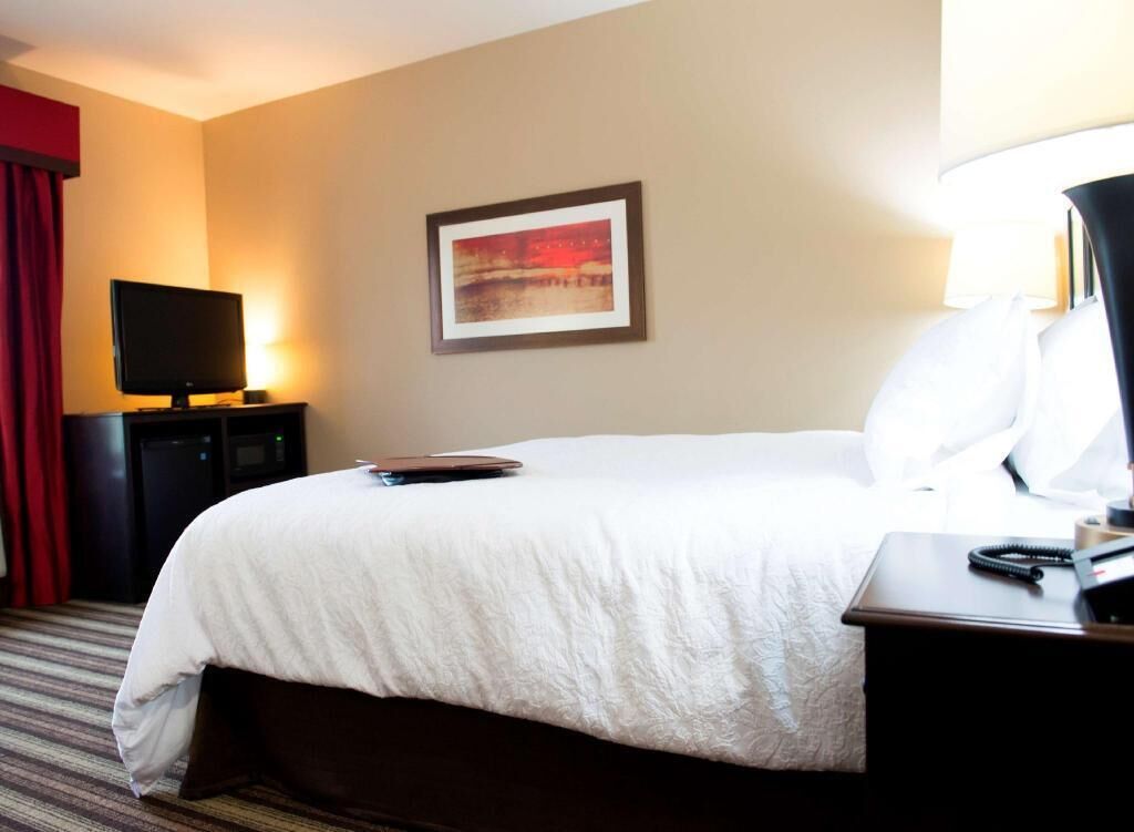Premium bedding, pillow-top beds, blackout curtains, iron/ironing board