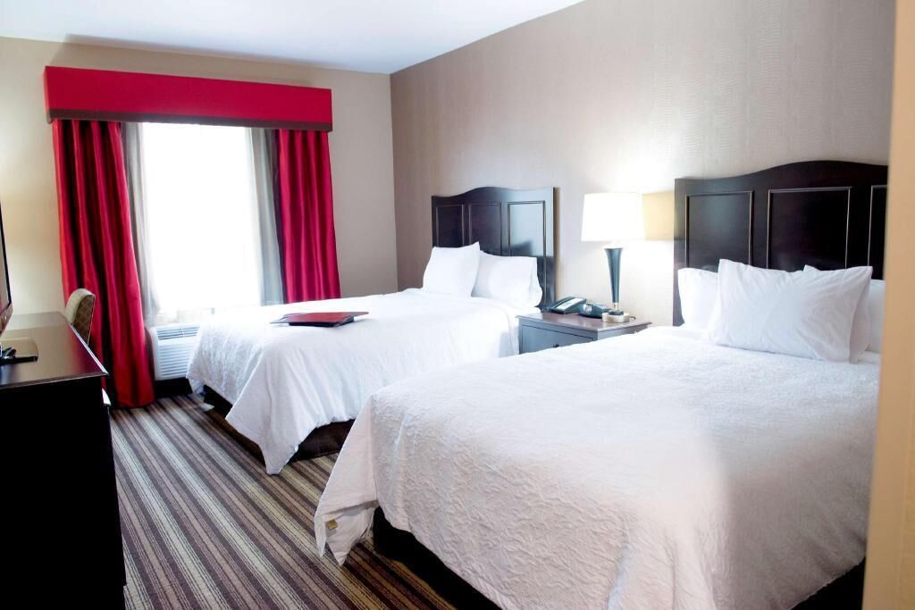 Premium bedding, pillow-top beds, blackout curtains, iron/ironing board