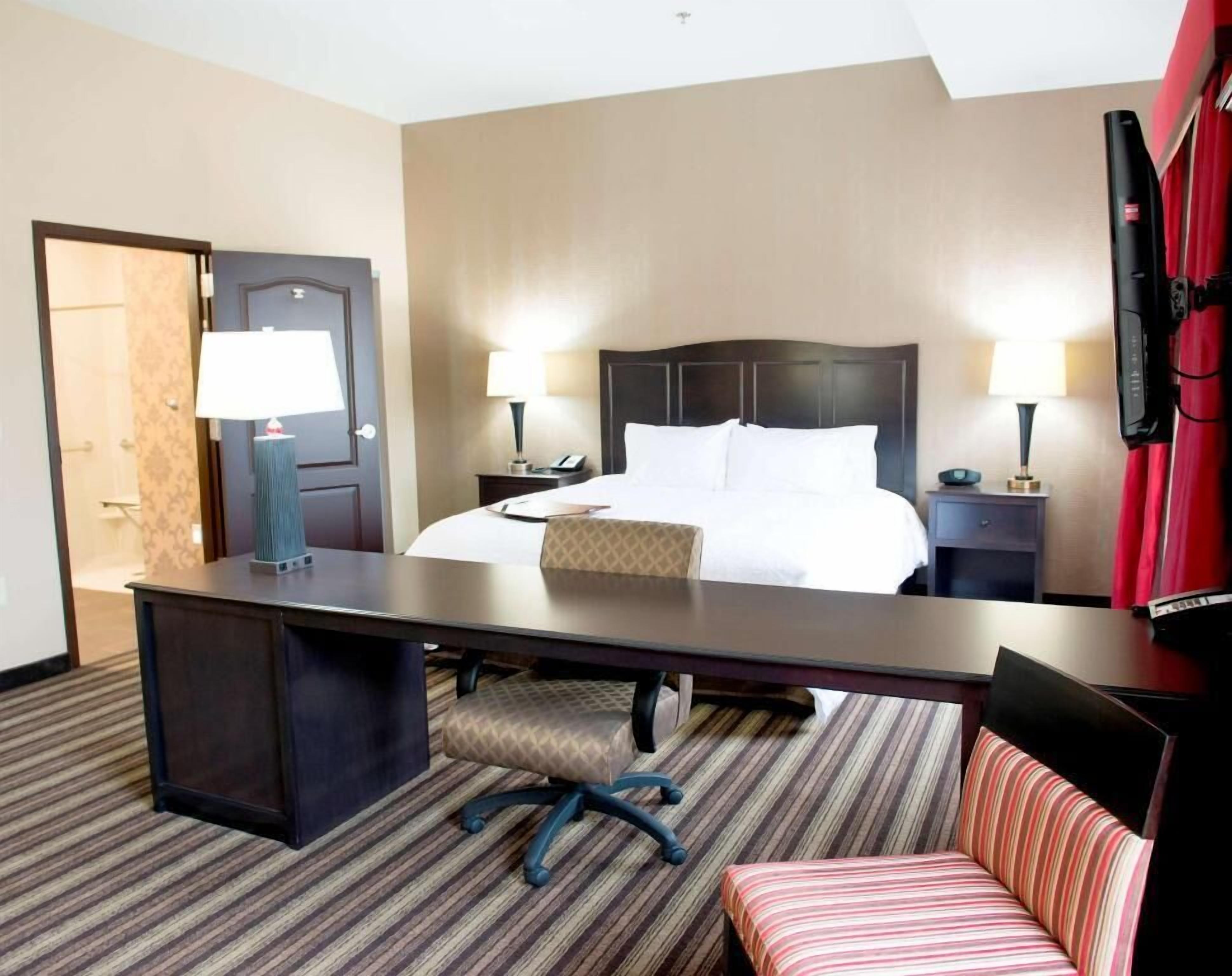 Premium bedding, pillow-top beds, blackout curtains, iron/ironing board
