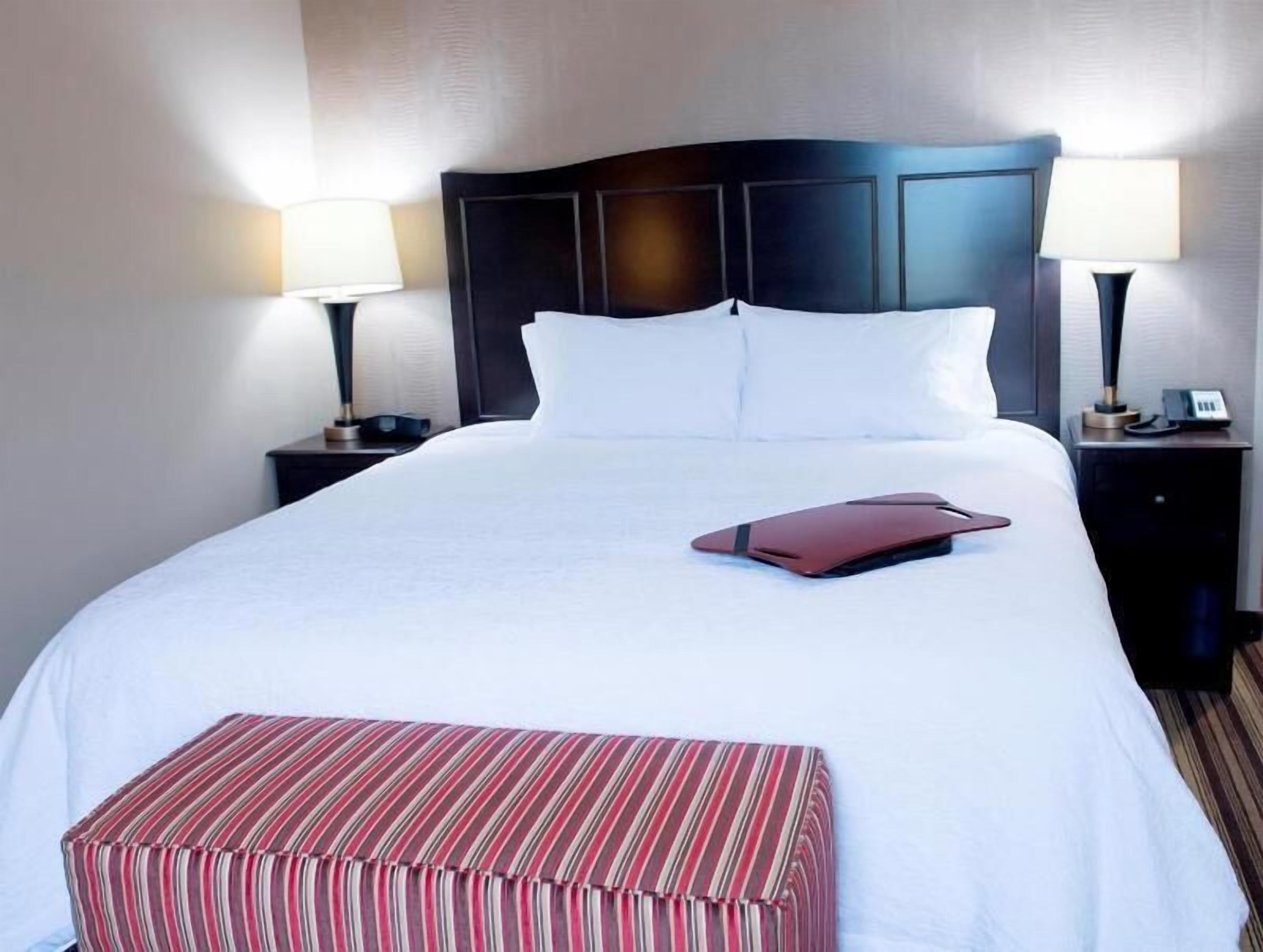 Premium bedding, pillow-top beds, blackout curtains, iron/ironing board