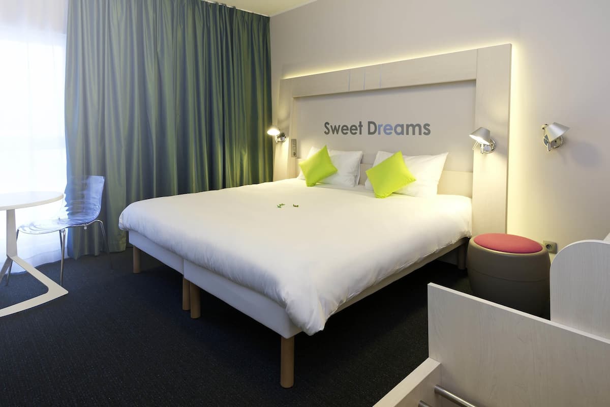 Pillow-top beds, desk, blackout curtains, soundproofing