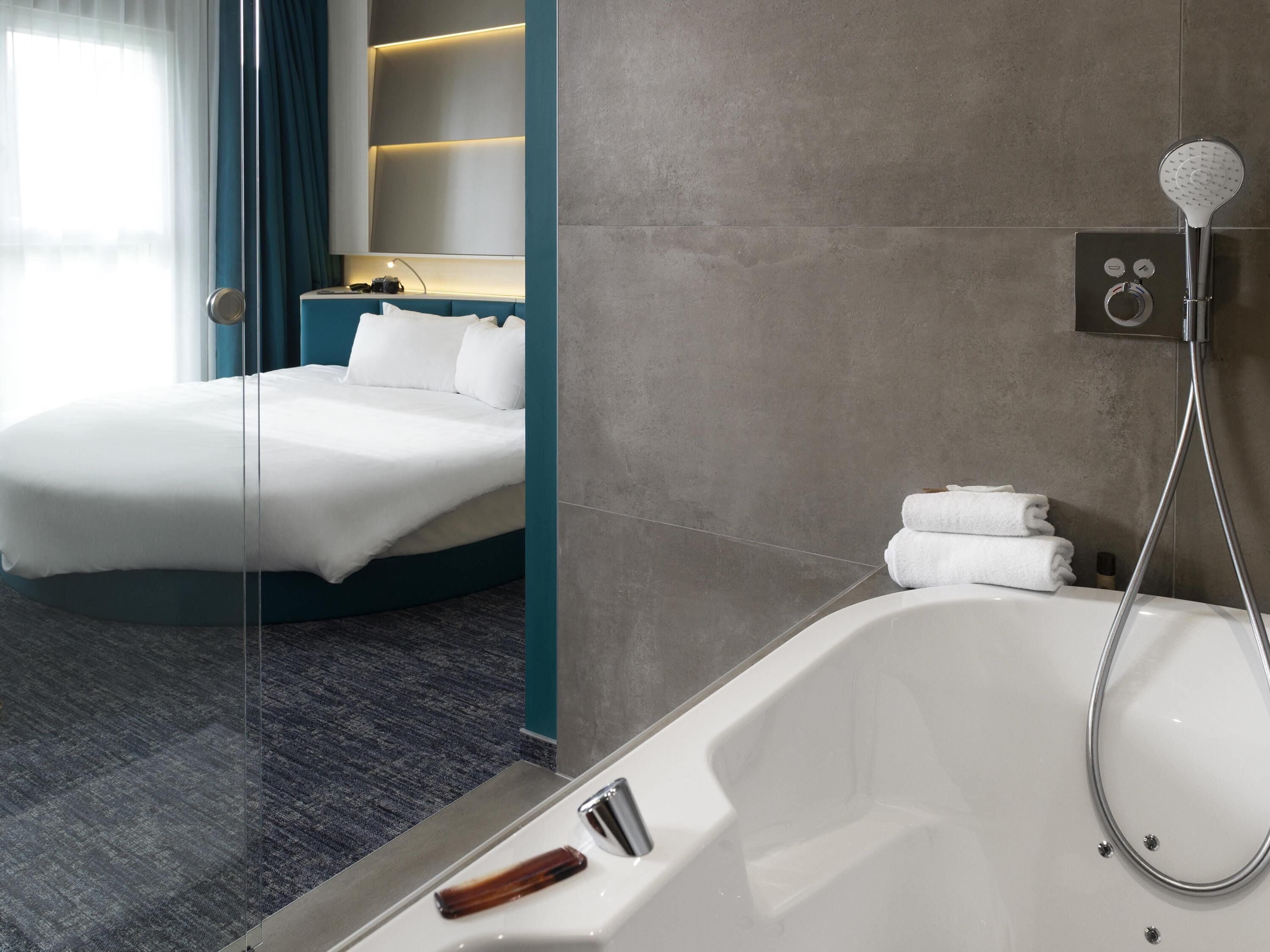 pillow-top beds, desk, blackout curtains, soundproofing