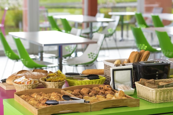 Daily buffet breakfast (EUR 14 per person)