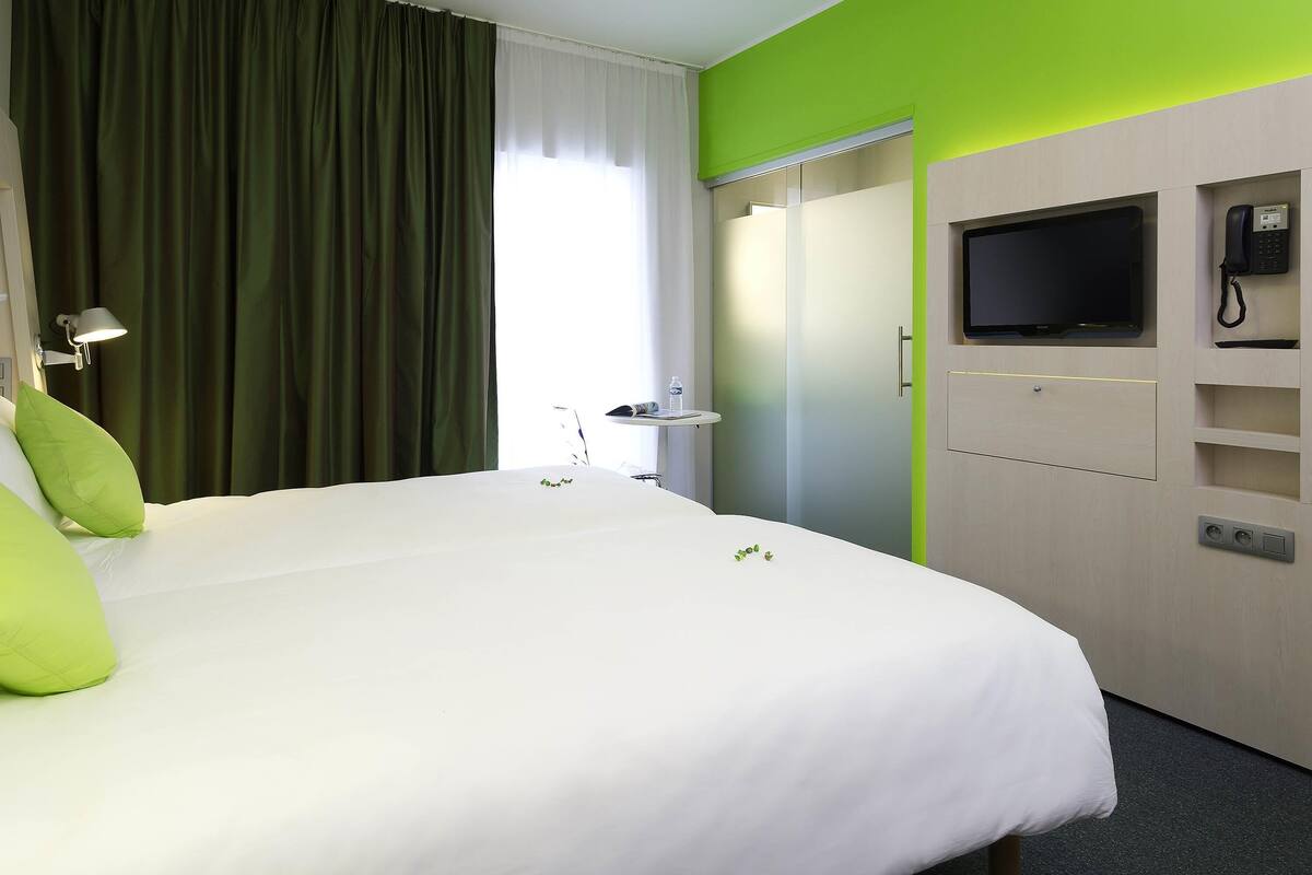 Pillow-top beds, desk, blackout curtains, soundproofing