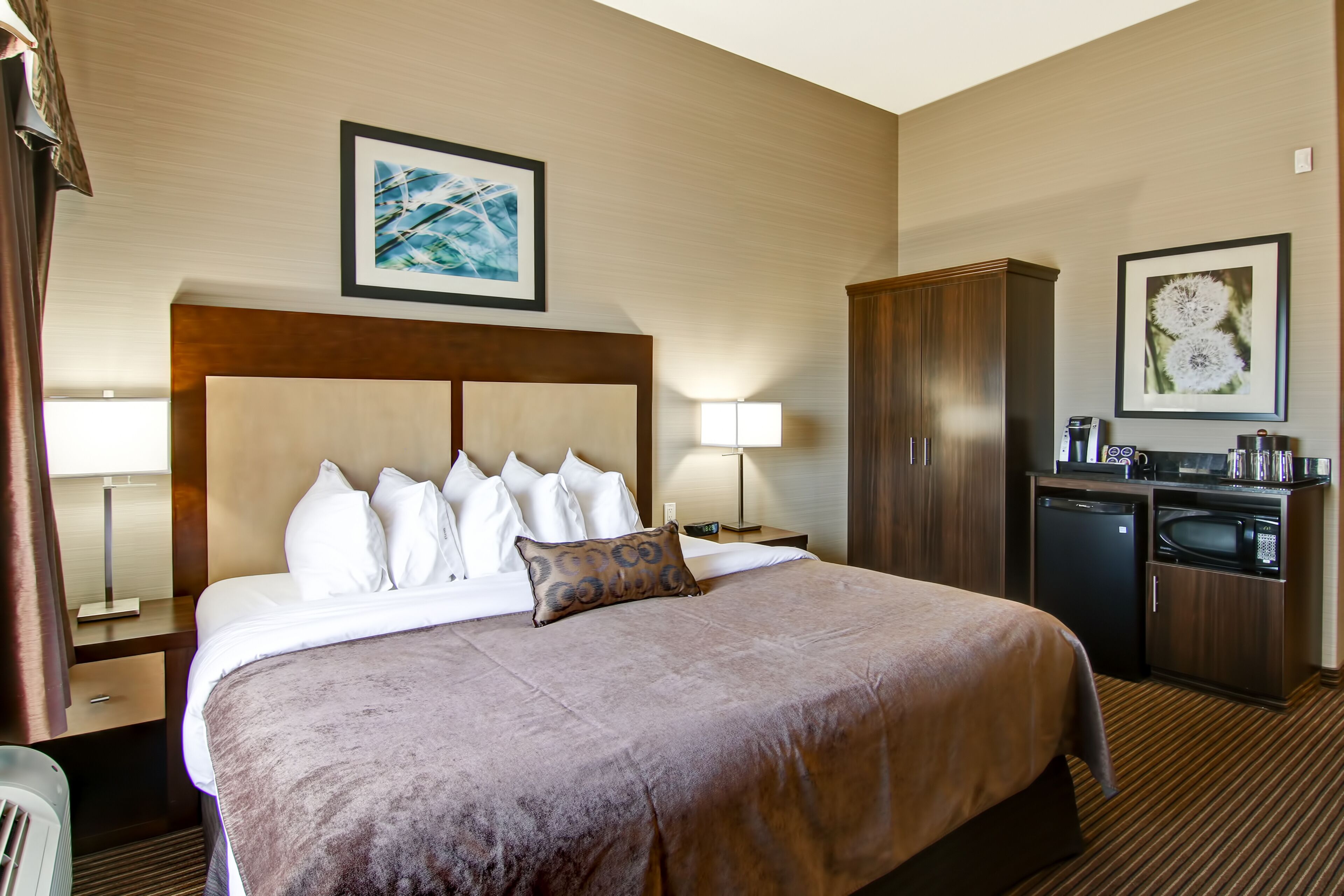 hypo-allergenic bedding, desk, laptop workspace, blackout curtains