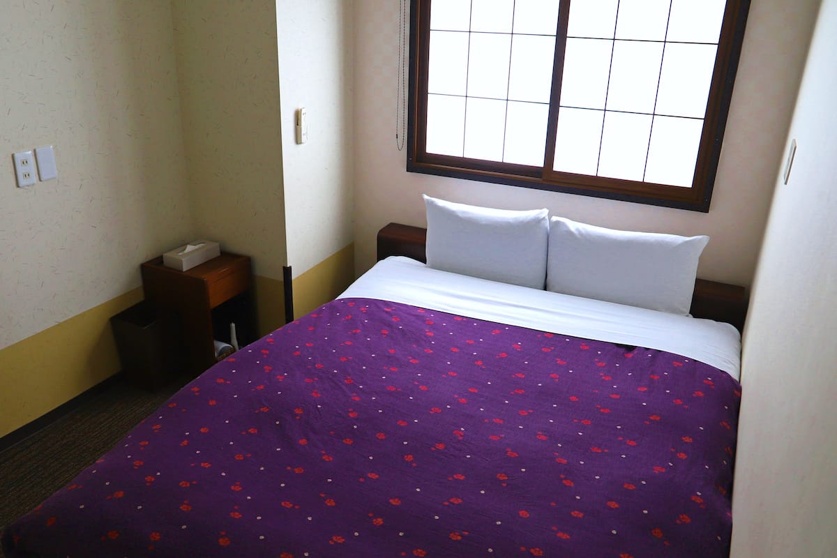 Compact Double Room (Private Bathroom) | Down comforters, blackout drapes, free WiFi, bed sheets