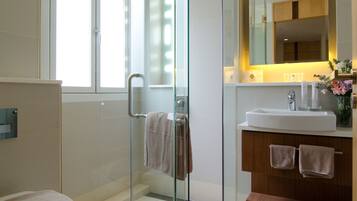 Shower, rainfall showerhead, designer toiletries, hair dryer