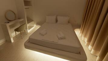 Estudio Deluxe, 1 cama de matrimonio con sofá cama | Zona de estar | Una televisión LED