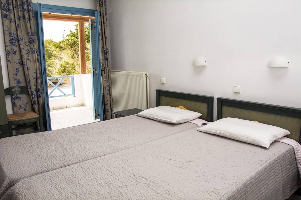 Double or Twin Room, Garden View | Iron/ironing board, free cots/infant beds, free rollaway beds, free WiFi