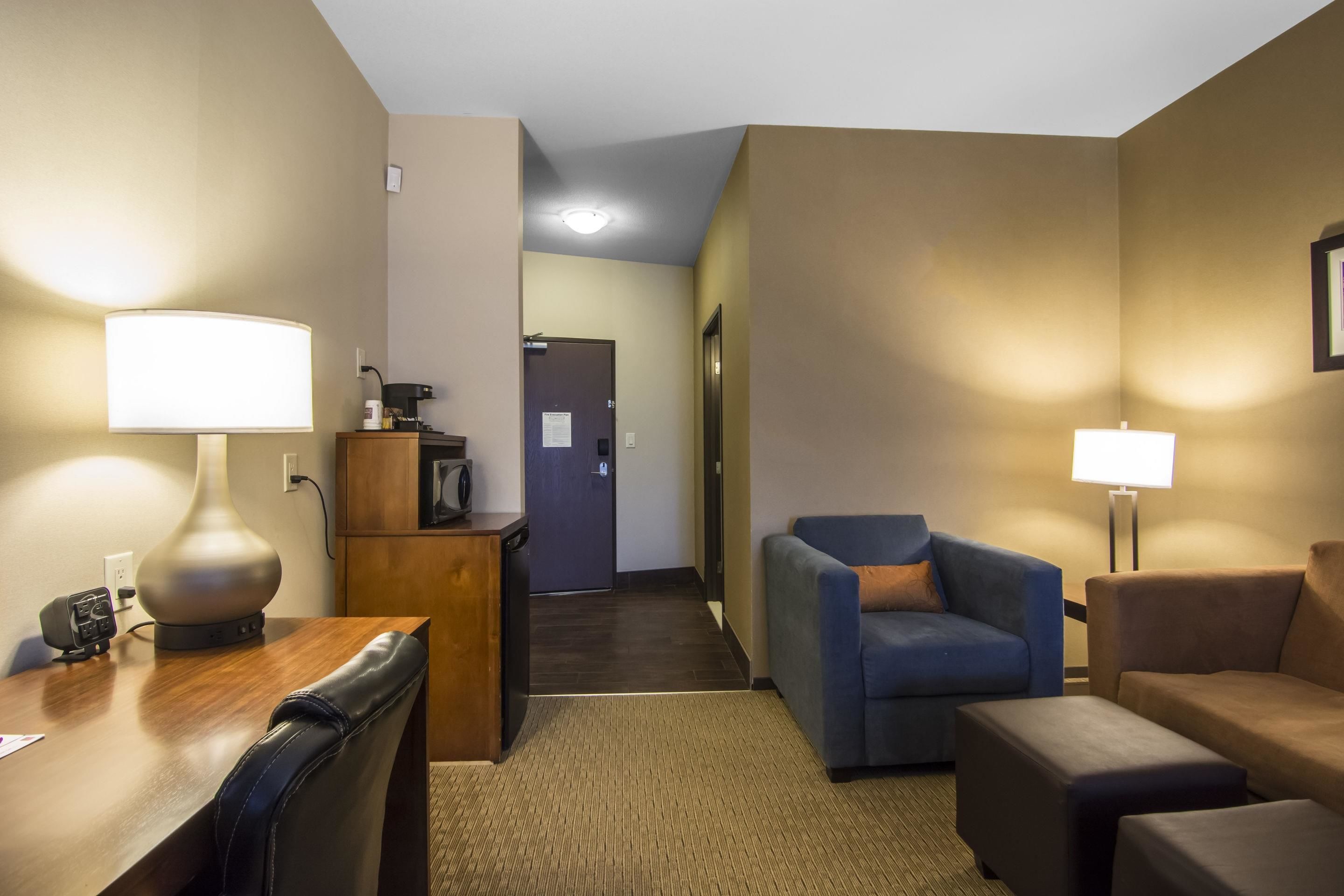 suite, 2 queen beds, non smoking | in-room safe, desk, laptop workspace, blackout curtains