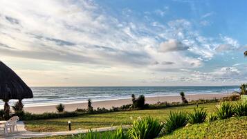 On the beach, sun-loungers, beach umbrellas, beach towels