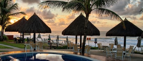 Outdoor pool, pool umbrellas, sun loungers