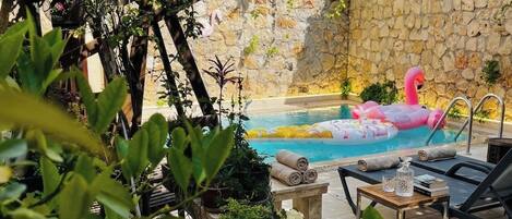 Outdoor pool, pool umbrellas, sun loungers