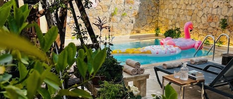 Outdoor pool, pool umbrellas, pool loungers