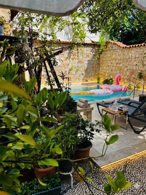 Outdoor pool, pool umbrellas, pool loungers