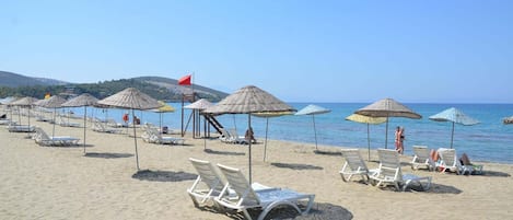 Beach nearby, sun loungers, beach umbrellas