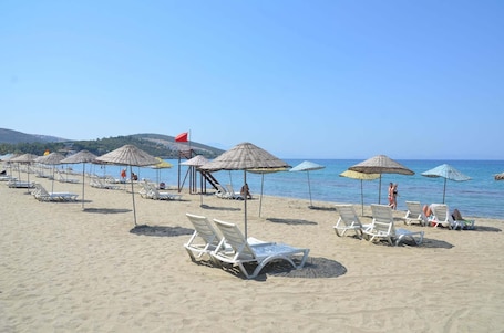 Beach nearby, sun loungers, beach umbrellas