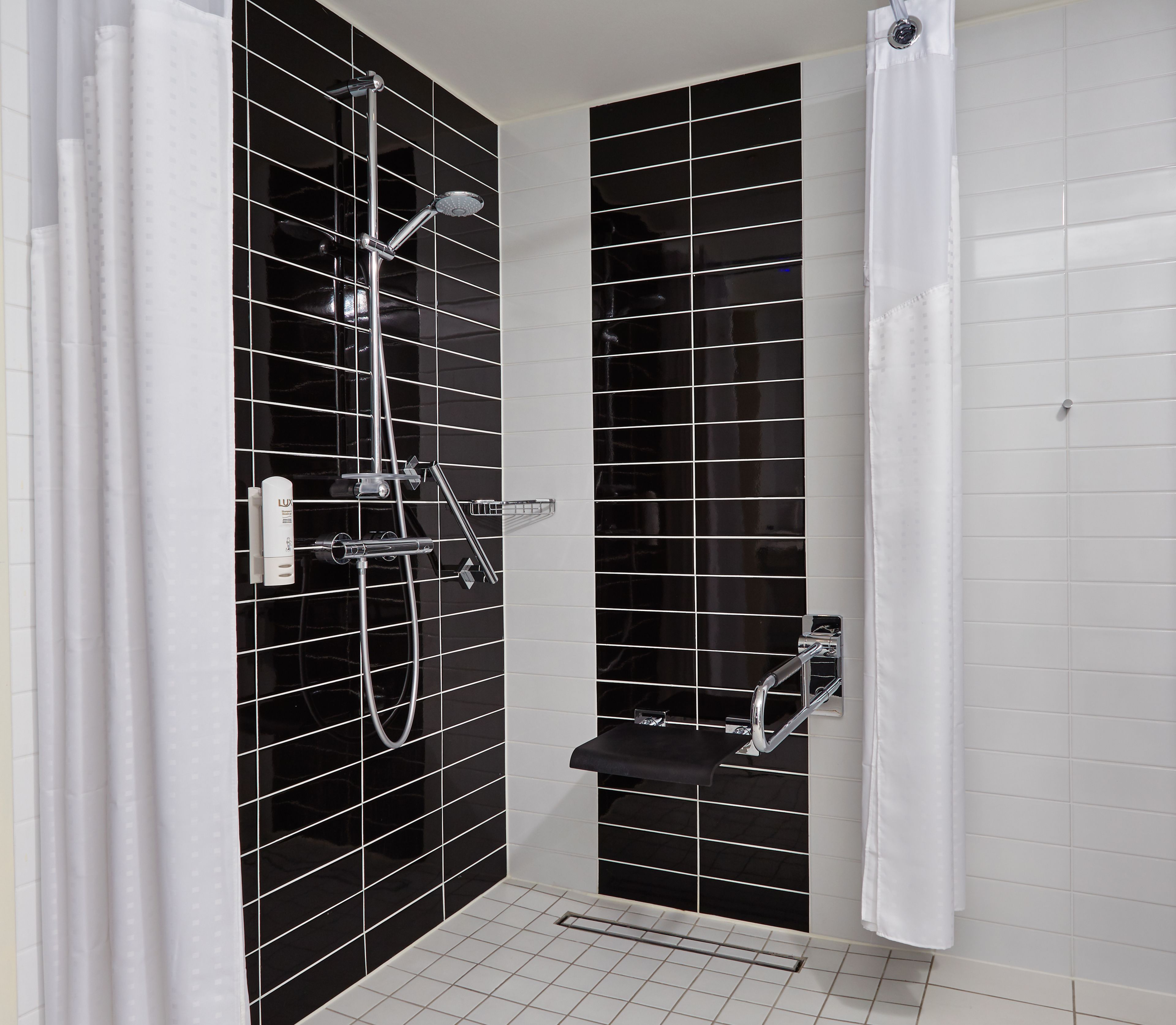 standard room, 1 double bed, accessible | bathroom | rainfall showerhead, hair dryer, towels, soap