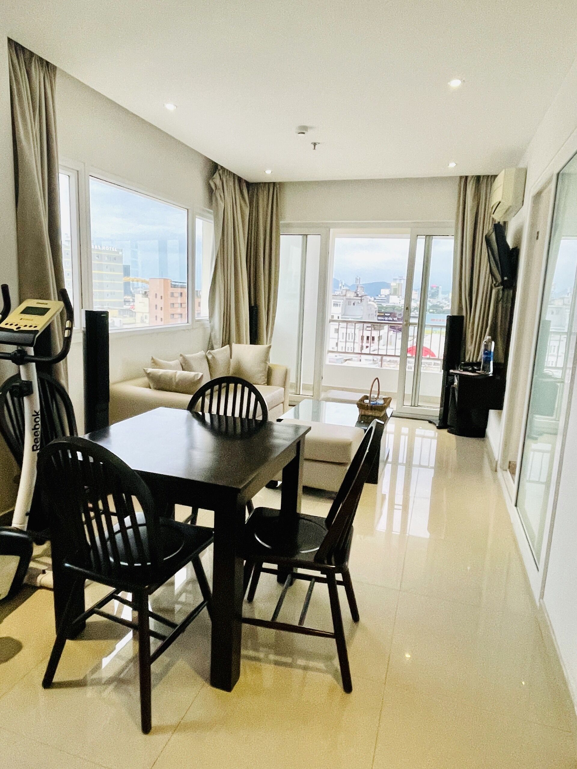 Apartment, 1 King Bed | Living area | 32-inch flat-screen TV with cable channels, TV