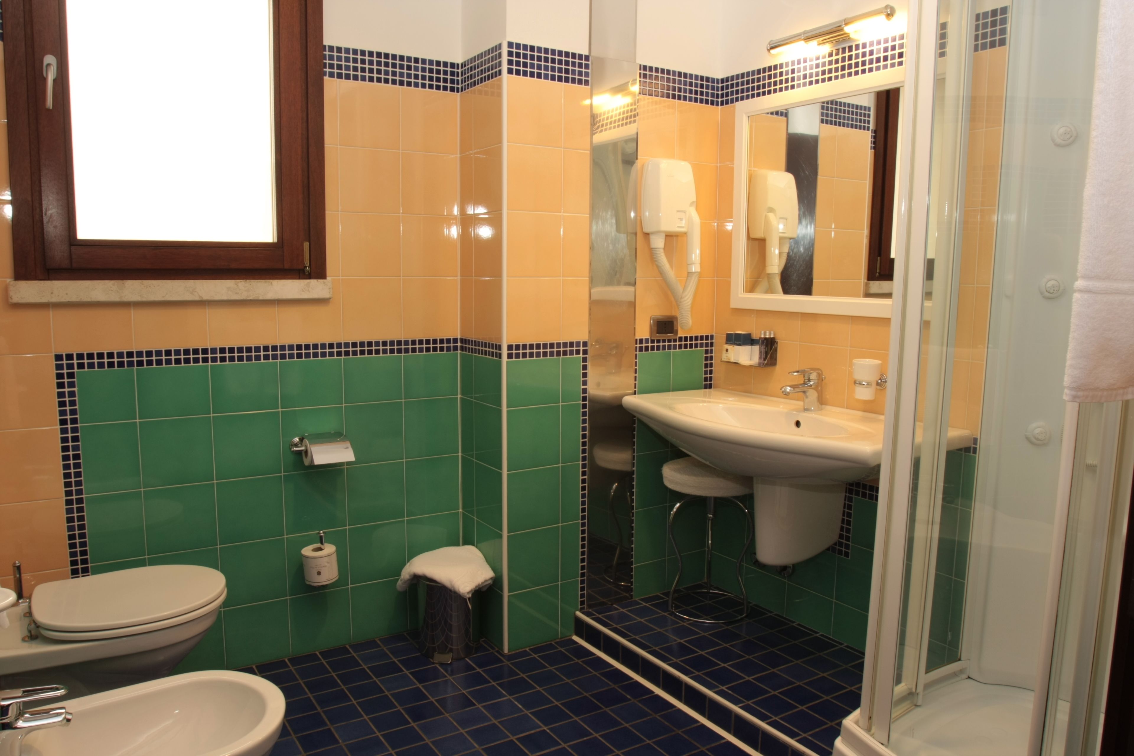 shower, free toiletries, hair dryer, bathrobes