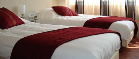 Chambre Confort double, 2 lits jumeaux, non-fumeur, vue sur le jardin | 1 chambre, literie de qualité, accÚs au Wi-Fi (inclus), literie fournie