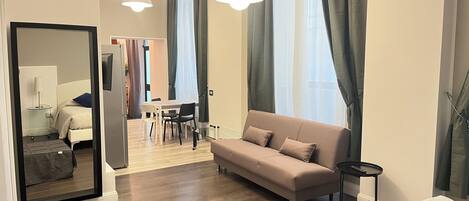 Executive Room, 1 Bedroom, Kitchen | Living area | 24-inch LCD TV with satellite channels, TV