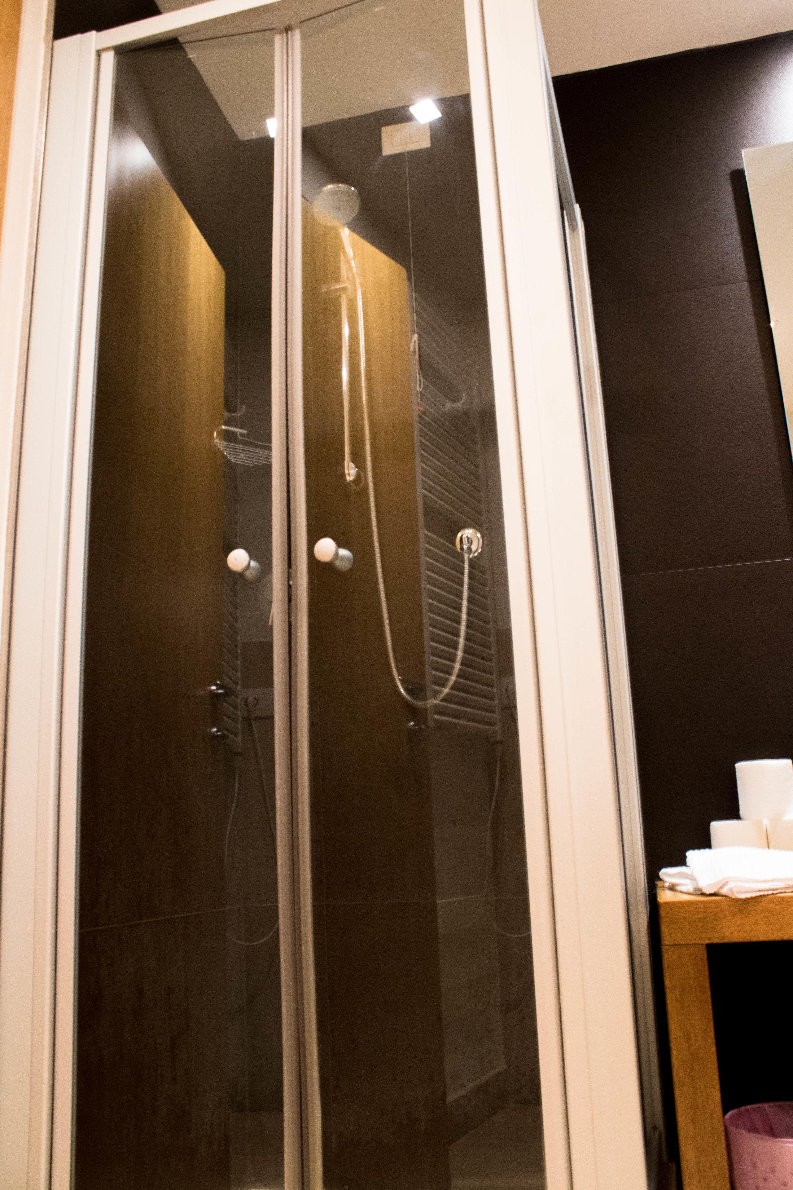 superior quadruple room | bathroom | shower, free toiletries, hair dryer, towels