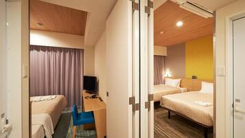 Escritorio, cortinas blackout, wifi gratis y ropa de cama