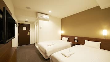 Desk, blackout curtains, free WiFi, bed sheets