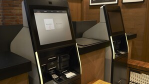 A self-service kiosk with a touchscreen interface, a receipt printer, and a card reader. - Sotetsu Fresa Inn Nihombashi Kayabacho (Tokyo)
