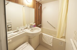 Twin kamer, niet-roken | Badkamer | Een bad/douchecombinatie, gratis toiletartikelen, een haardroger