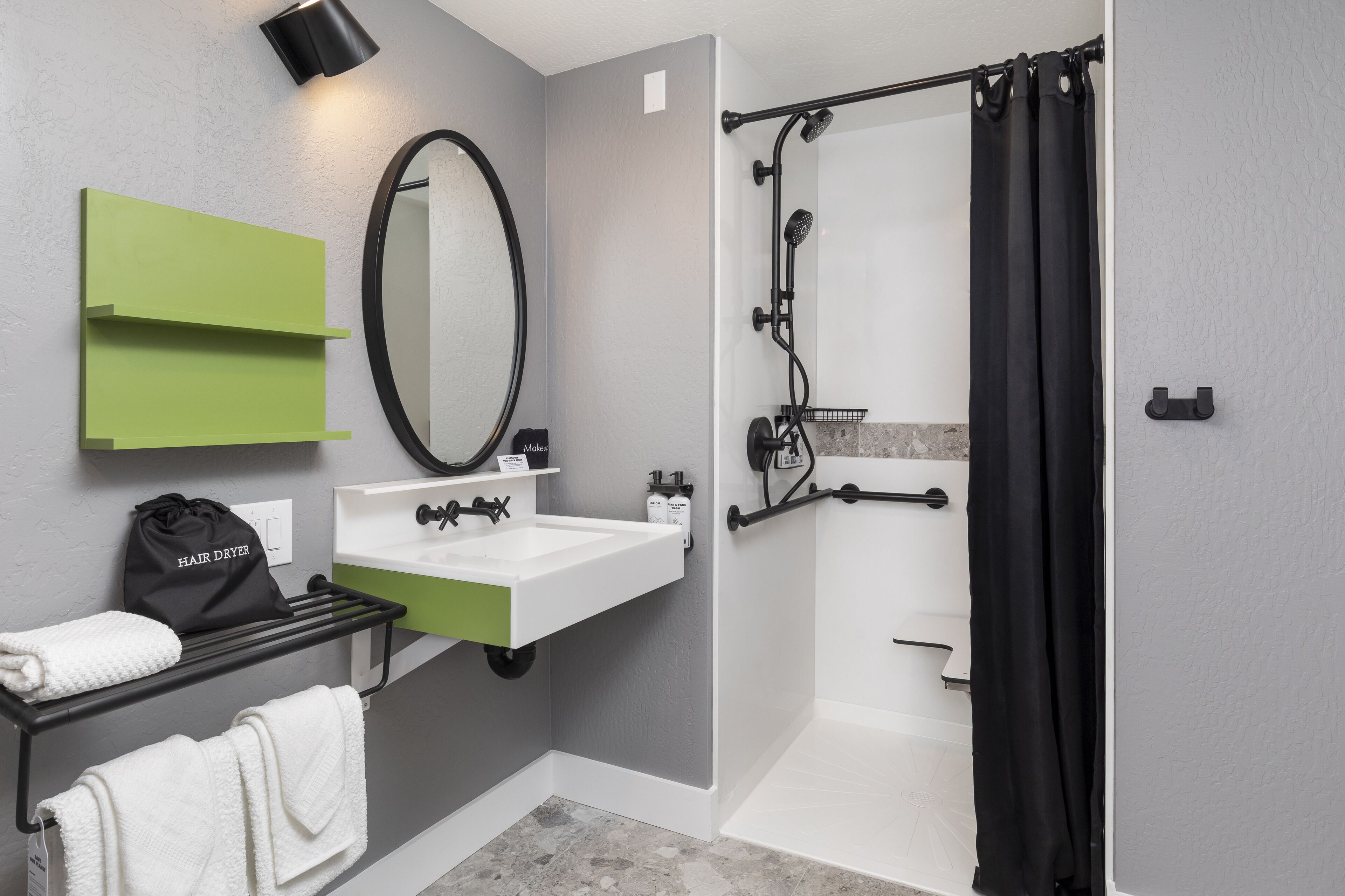 room, 1 king bed, roll-in shower | bathroom | shower, hair dryer, towels, soap