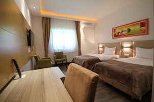 Twin Room | Bathroom | Shower, free toiletries, hair dryer, bathrobes