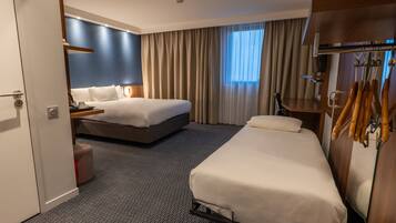 Premium bedding, individually furnished, desk, blackout drapes