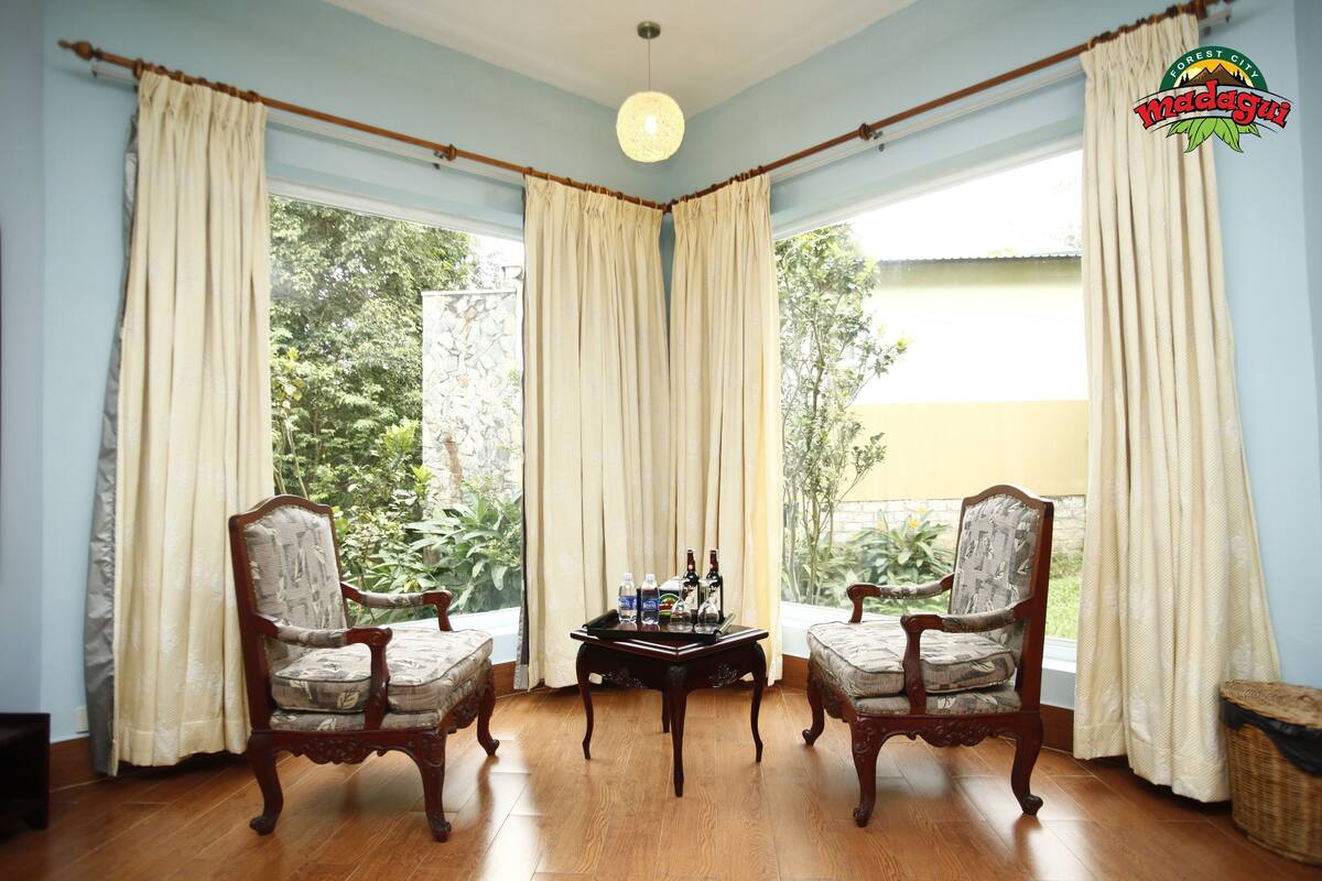 Phòng Suite, quang cảnh vườn | Khu phòng khách