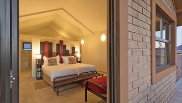 Coffres-forts dans les chambres, draps fournis