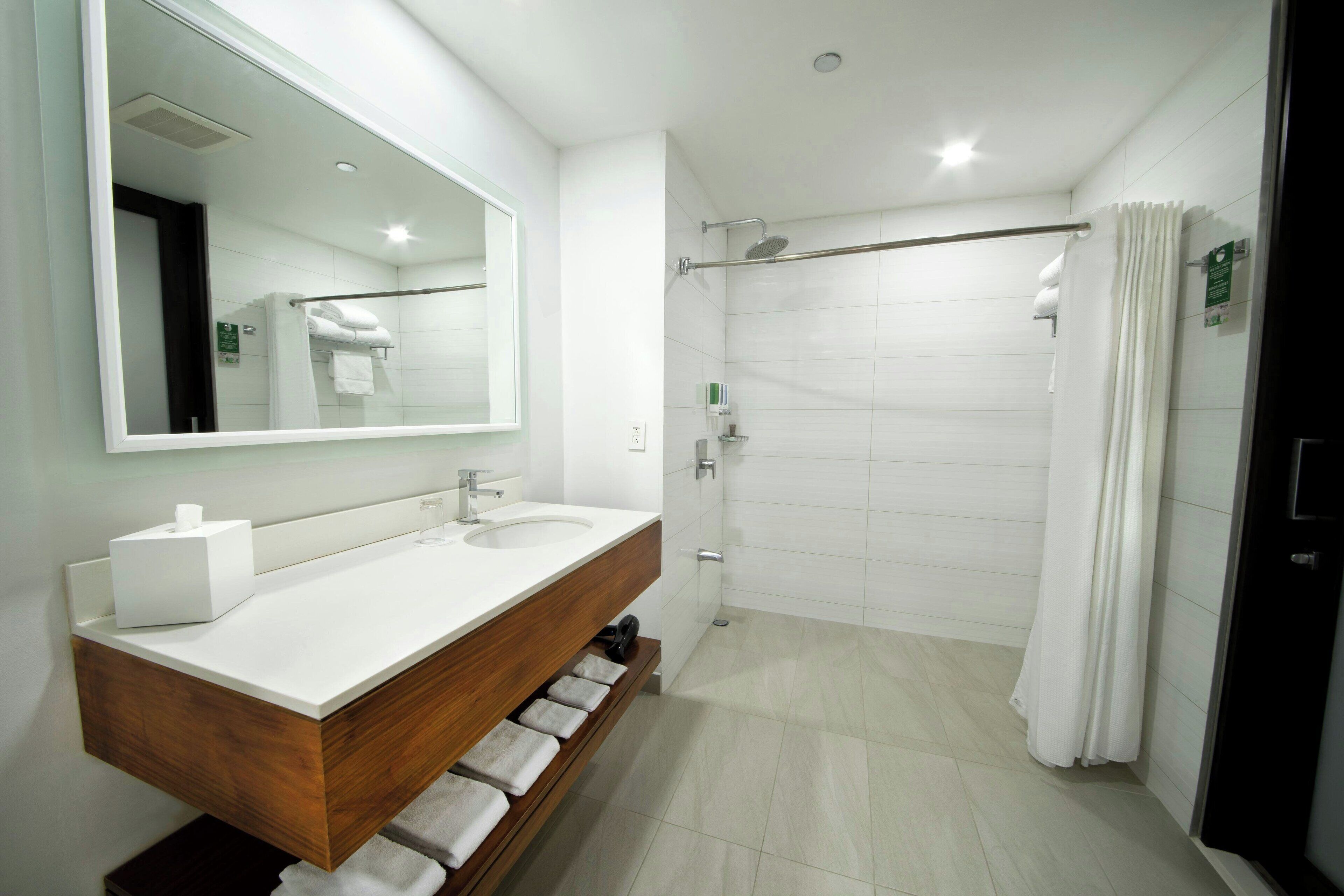 shower, eco-friendly toiletries, hair dryer, towels