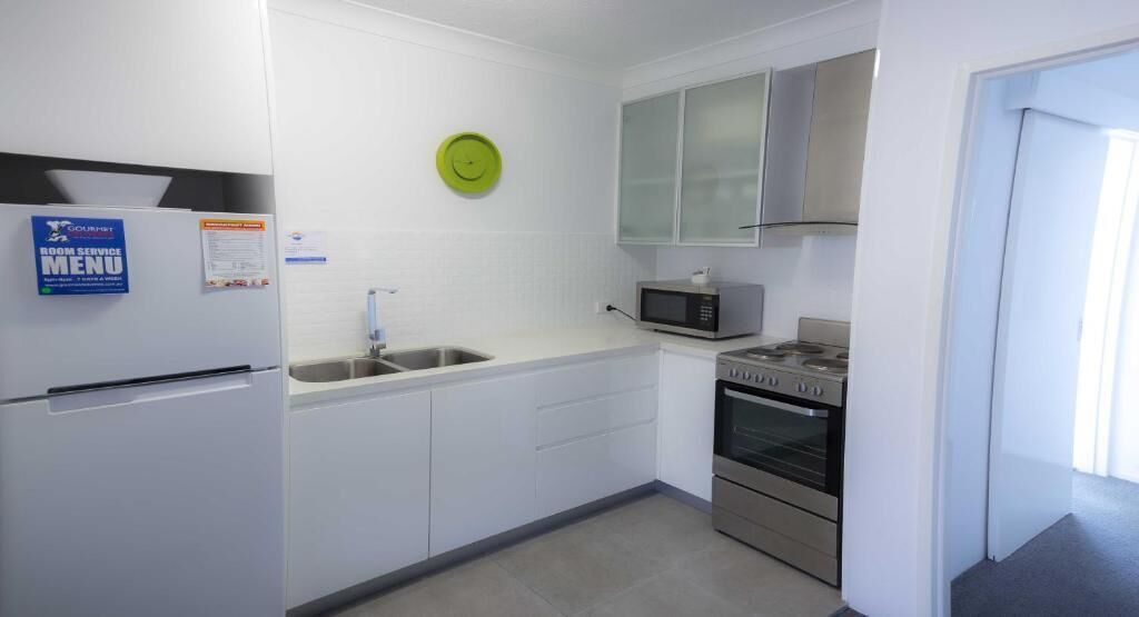 Standard Apartment | Private kitchen | Full-size fridge, microwave, stovetop, coffee/tea maker