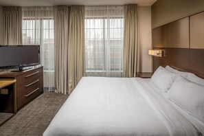 Premium bedding, down comforters, desk, laptop workspace