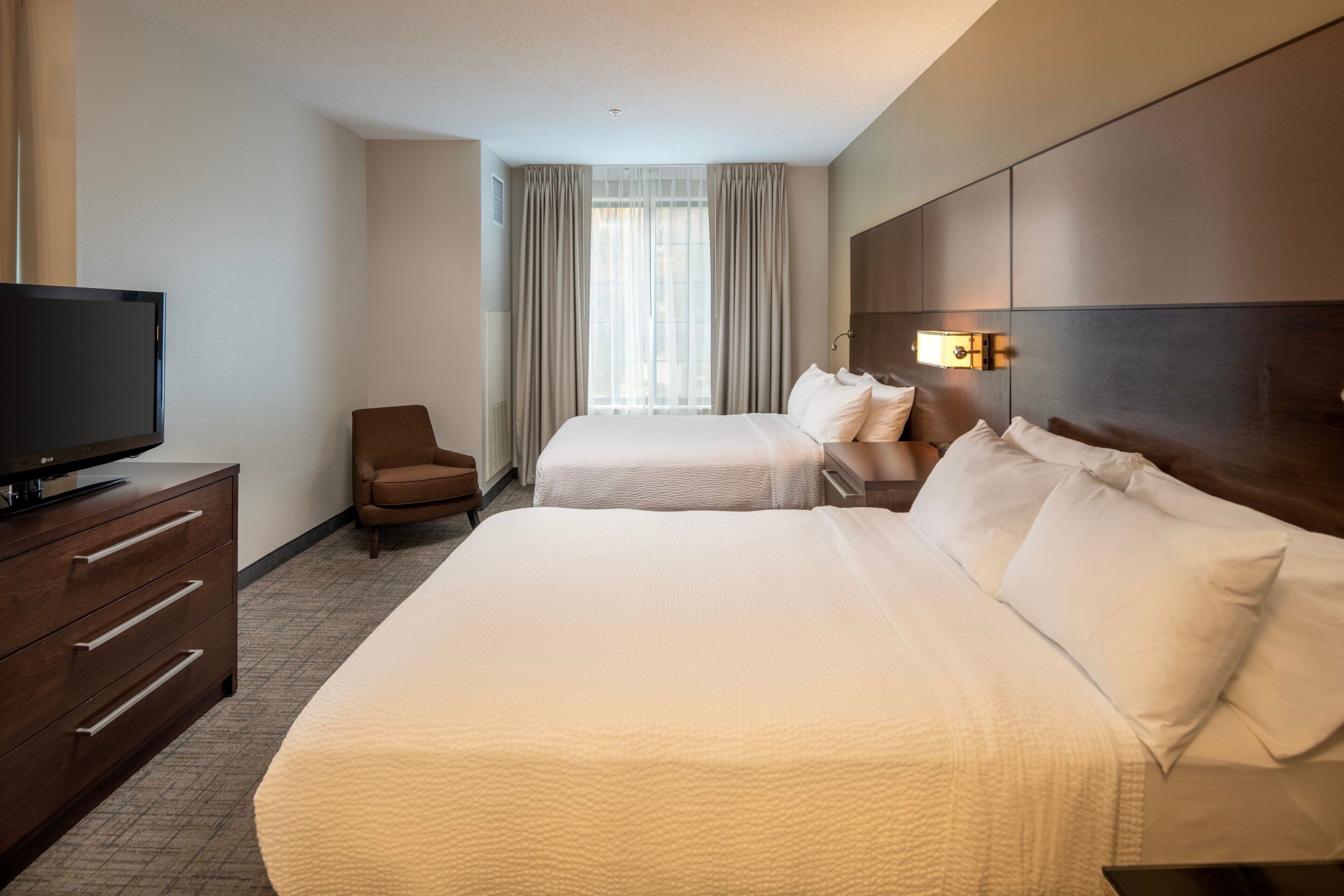 premium bedding, down duvets, desk, laptop workspace