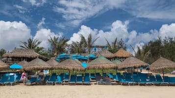 Private beach, beach umbrellas, beach towels