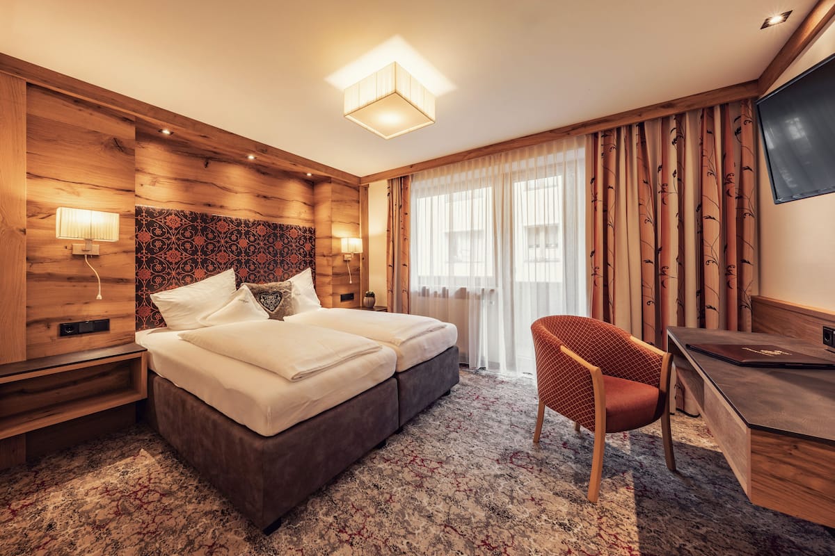 Comfort-Einzelzimmer, Balkon | 1 Schlafzimmer, Zimmersafe, Schreibtisch, Verdunkelungsvorhänge