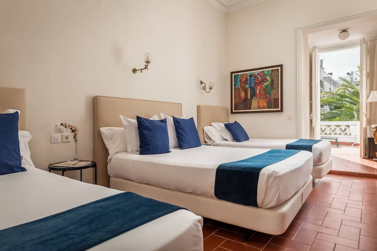 Quadruple Room, Terrace | Minibar, in-room safe, free WiFi, bed sheets