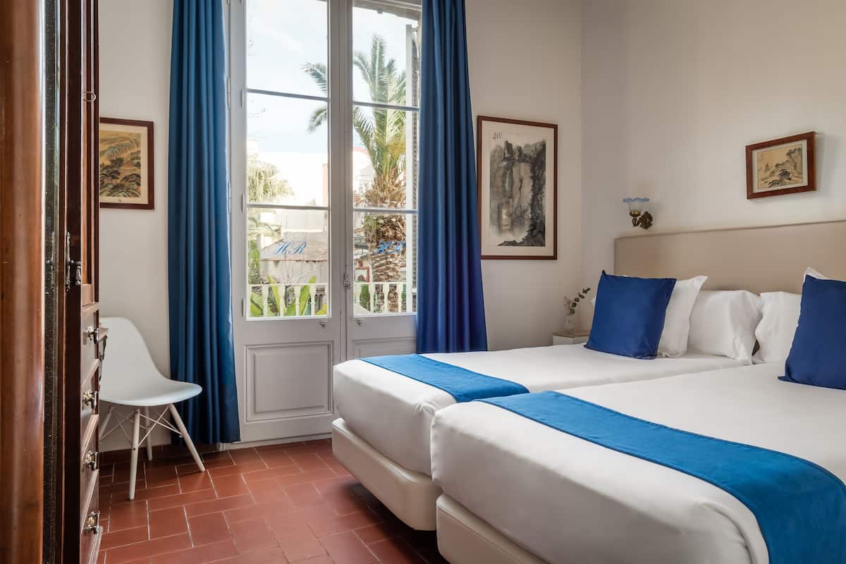 Double or Twin Room | Minibar, in-room safe, free WiFi, bed sheets