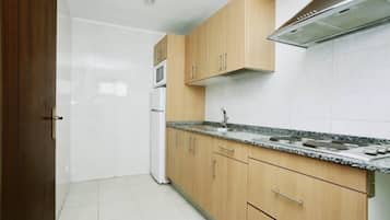 Standard Apartment, 2 Bedrooms | Private kitchen | Fridge, microwave