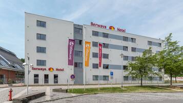 Serways Hotel features a clean, contemporary design with a flat roof and symmetrical windows.